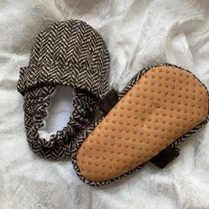 No brand labeled. 0-3 months. Girls strap shoes. Brown and white stripes.